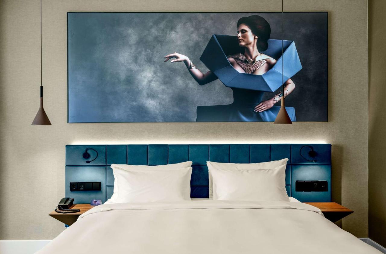 Radisson Blu Aurum Hotel, Braşov Dış mekan fotoğraf A bedroom at the hotel